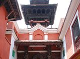 Kathmandu Patan Golden Temple 01 Entrance Towards Inner Courtyard The Golden Temple is a Buddhist monastery just north of Durbar Square in Patan built somewhere between 12C and 15C. The Golden temple is also known as Hiranya Varna Mahavihara or Kwa Bahal. The entry to the courtyard of the Golden Temple in Patan has many ornately carved many-armed deities flanked by a pair of griffins.